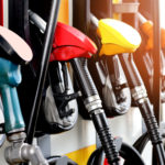 red green yellow orange color fuel gasoline dispenser background