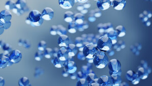 Abstract water hydrogen and oxygen glass molecules floating in blue fluid background with selective focus - 3D illustration, environment, water or clean energy concept